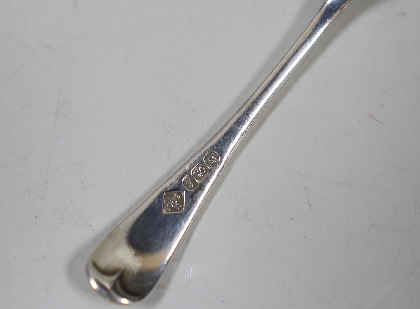 Three 18th century silver snuff spoons, 79mm and three later silver condiment spoons, 31 grams.